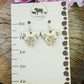 Small Descending Triangle Peony Engraved Wood Earrings - A Farm Girl by Tess | Handmade Alpaca Wool Winter Hats for Women